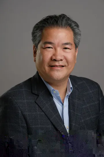 Portrait of Darren Dang.