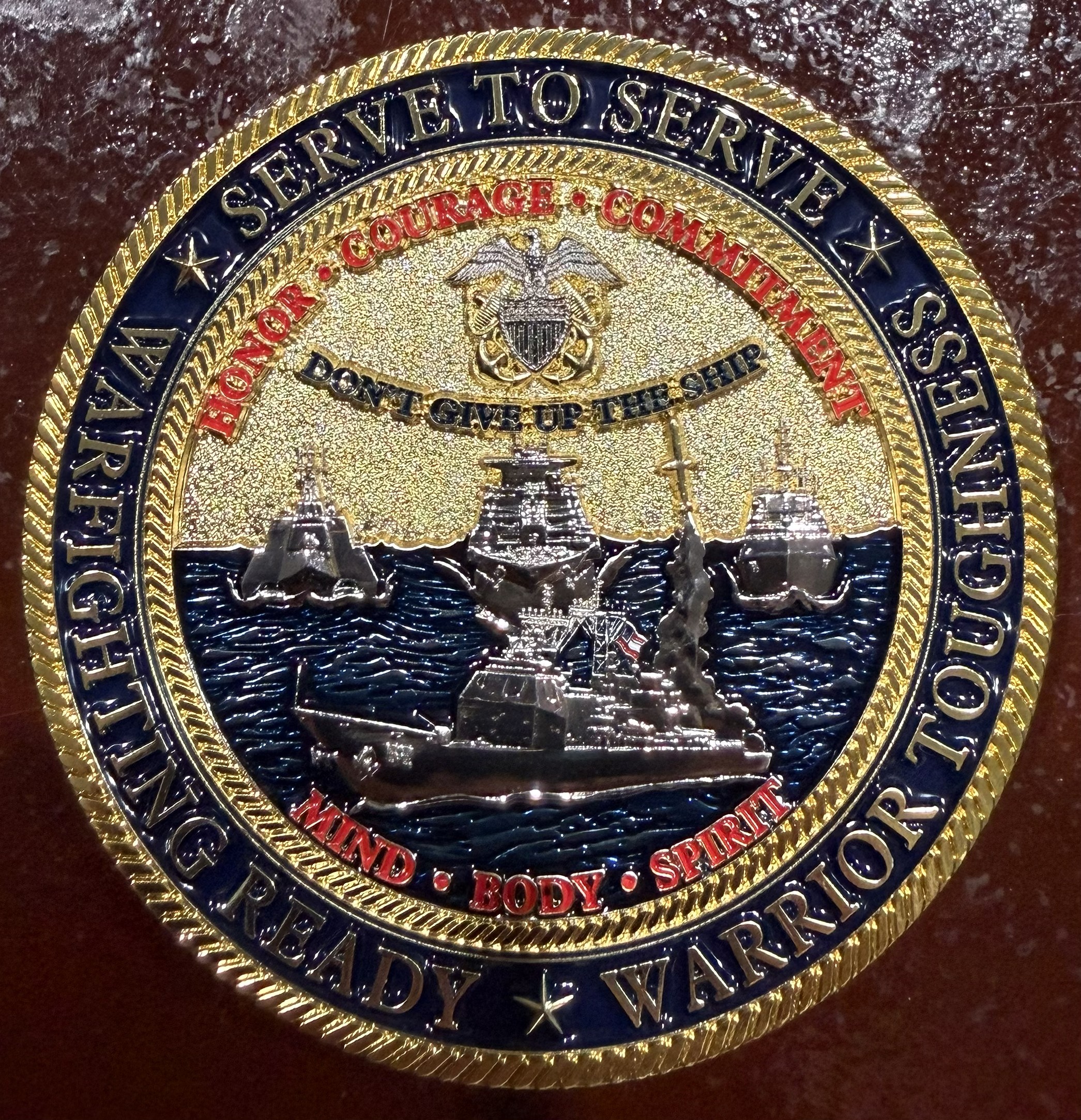 Back of the challenge coin from Rear Admiral Robert Nowakowski's retirement event.