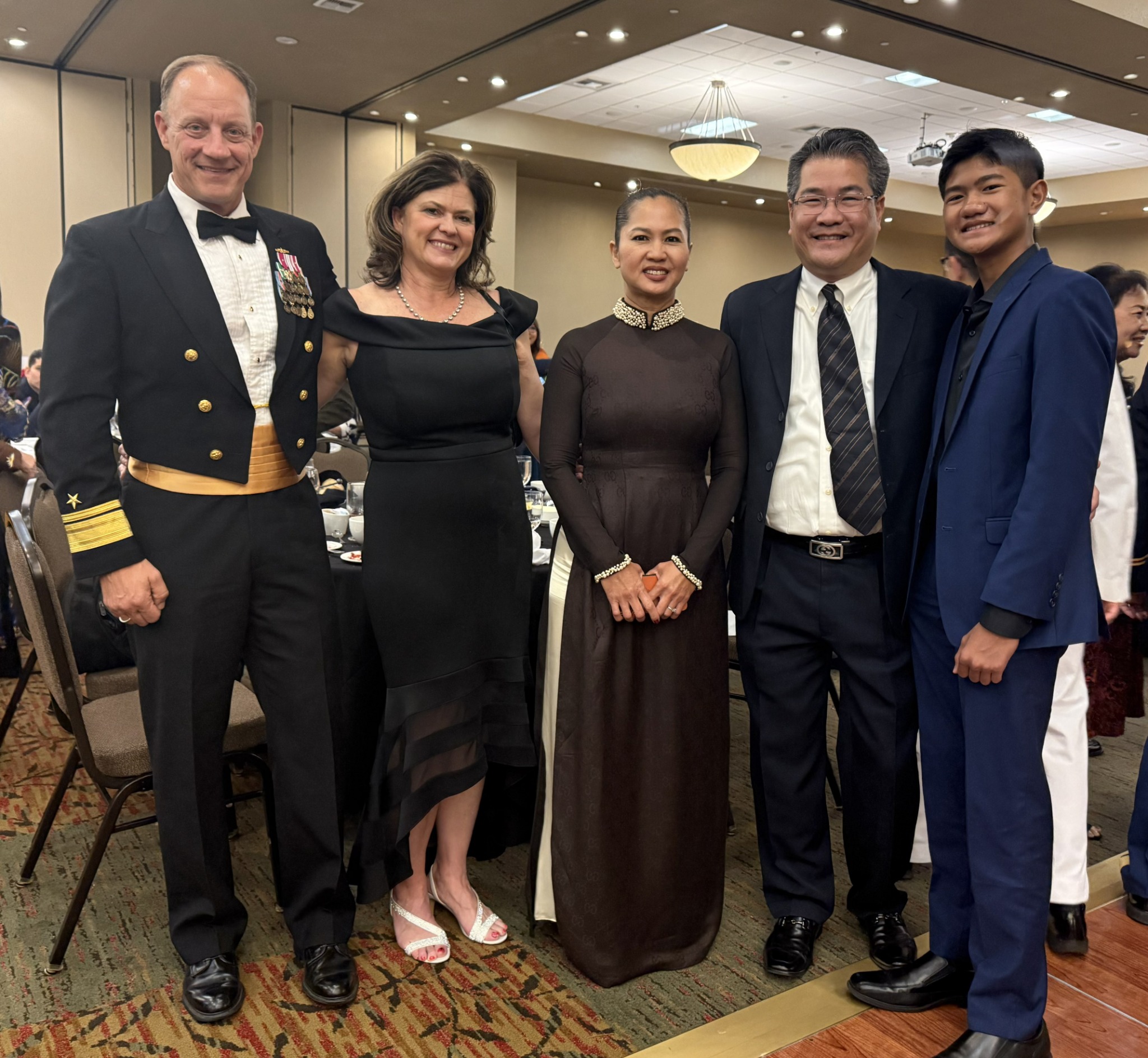 Nathan Dang with his parents Darren and Chrystina and Rear Admiral Robert Nowakowski at the VSA Gala.