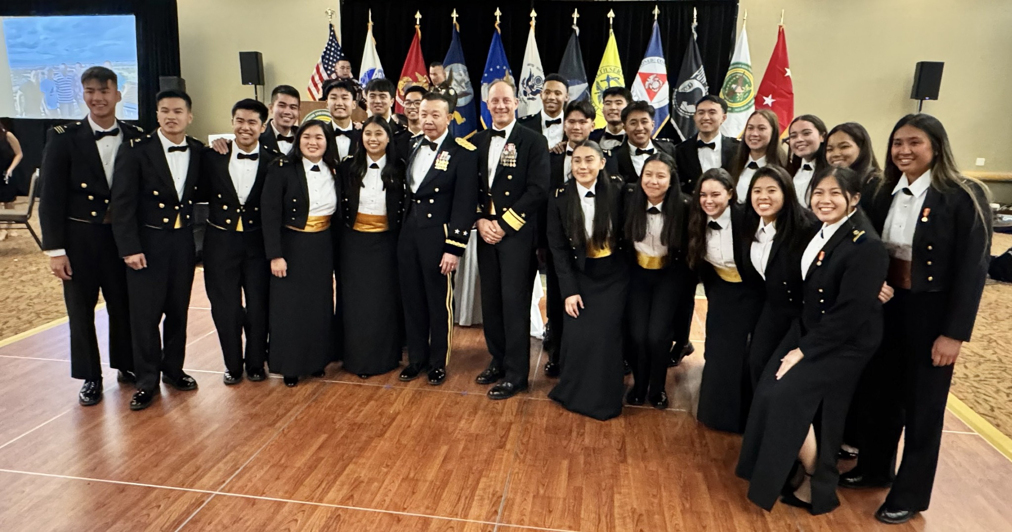 Rear Admiral Robert Nowakowski with United States Naval Academy midshipmen at the VSA Gala.